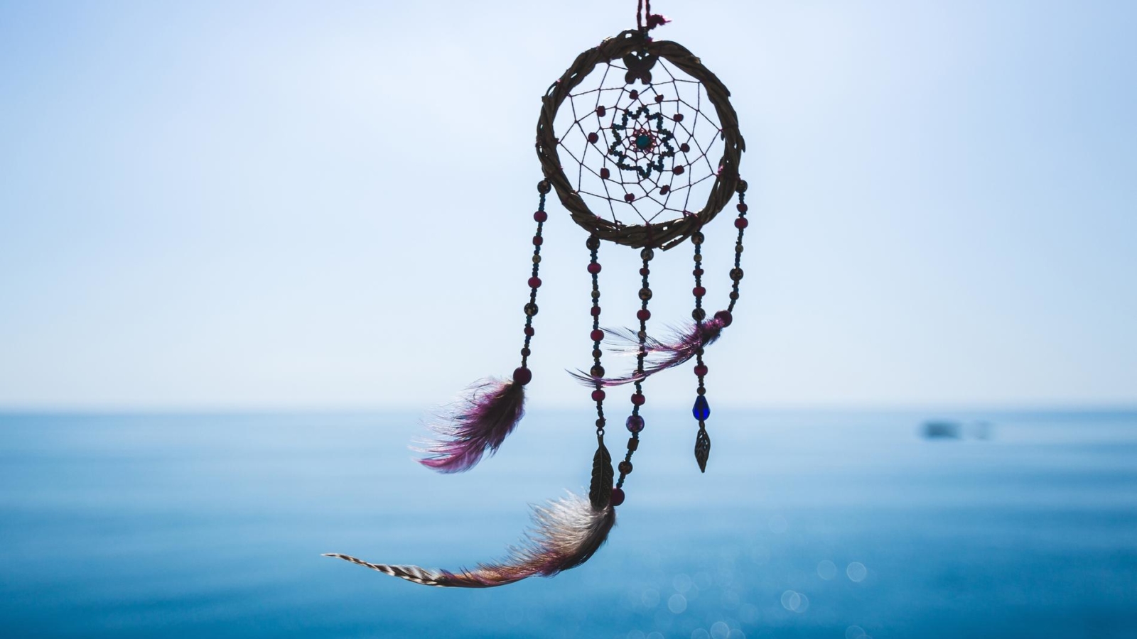 Dream catcher on the sea background